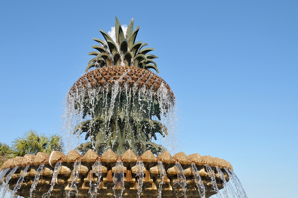 pineapples as prestige - The Pineapple Fountain in Charleston is a familiar landmark in a historic Atlantic port city, long associated with trade, travel and hospitality.