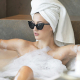 At-home spa day - woman in a bath tub.