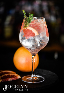 Gin Infusions - gin in a glass with an orange
