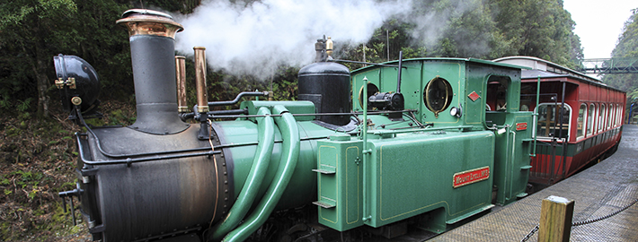 slow travel essentials Australia - Historic steam locomotive on the West Coast Wilderness Railway in Tasmania