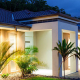 Modern coastal townhouse complex representing lifestyle village vs body corporate living in Australia
