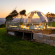 Luxury clear dome accommodation overlooking the Sunshine Coast Hinterland at sunset