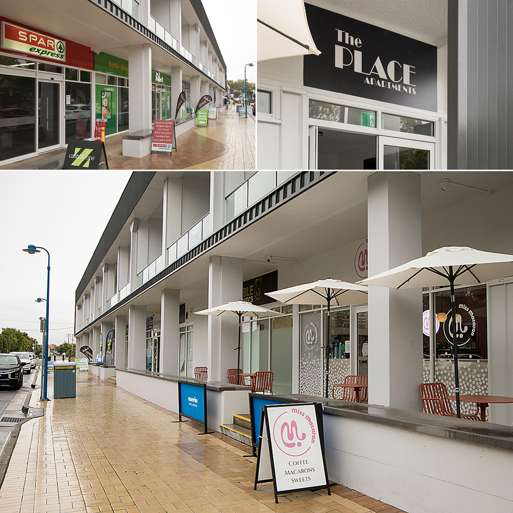 Commercial businesses and apartment entrances at The Place Urangan redevelopment.