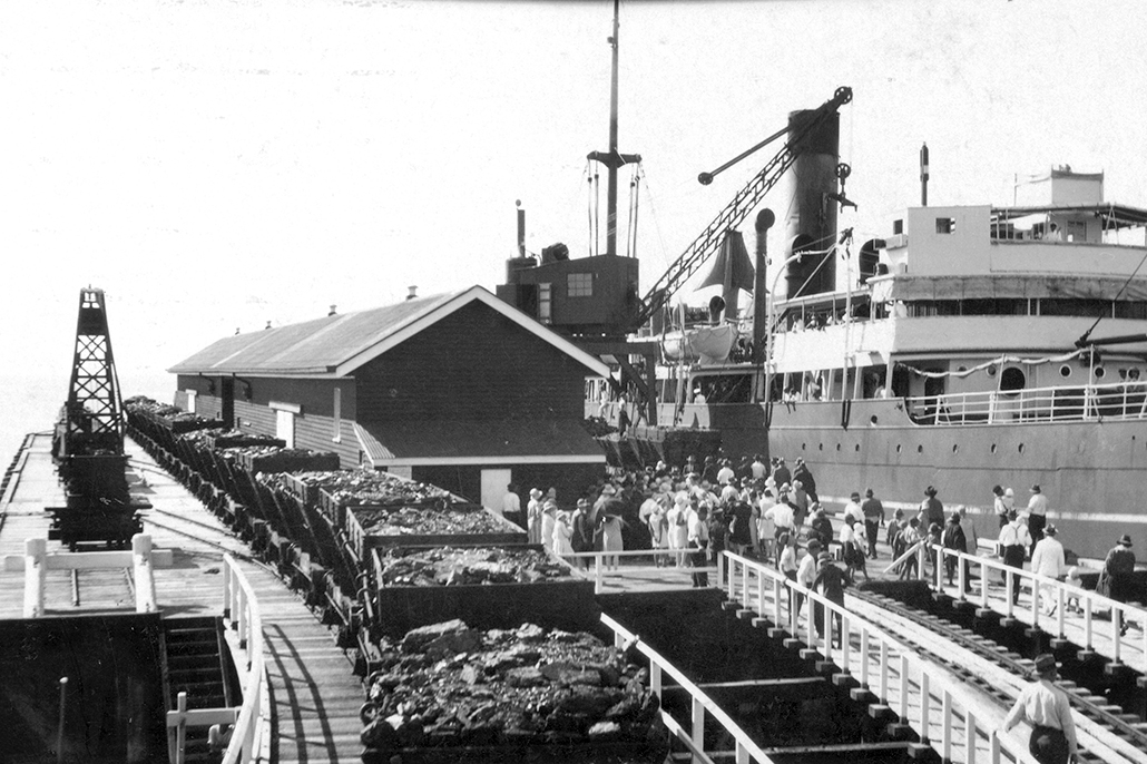 Urangan Pier history, Hervey Bay industrial history, export trade, steamships, Fraser Coast history, working waterfront, warehouse design, industrial heritage, The Place Urangan, local history, coastal Queensland history