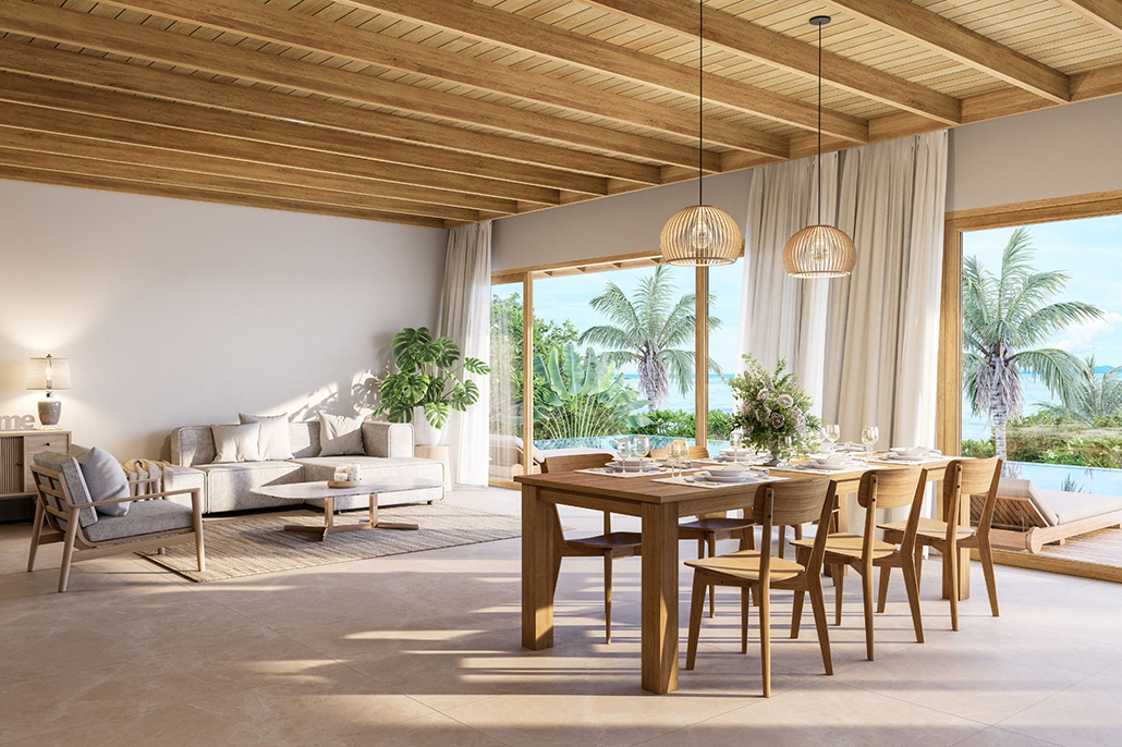 Queensland coastal living: Open-plan coastal dining and living area flowing into a tropical outdoor space
